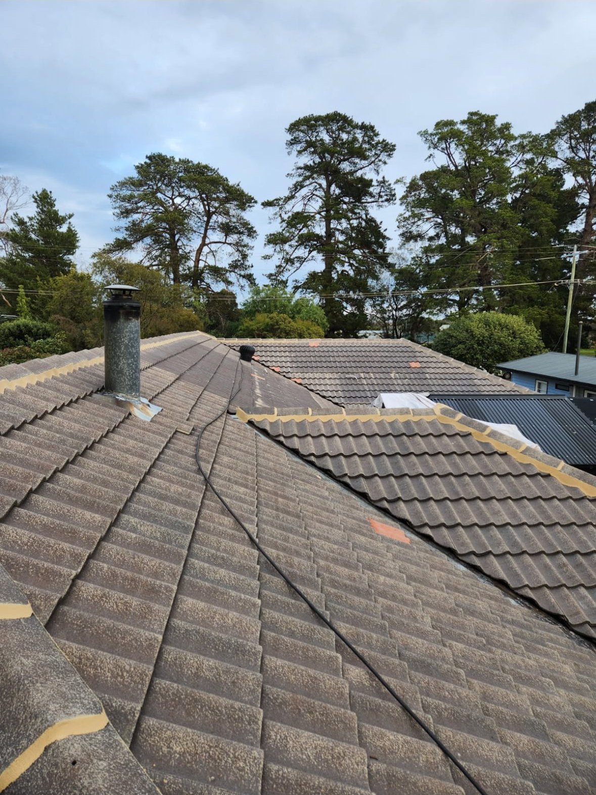Roof before restoration, worn concrete tiles Melbourne south-east